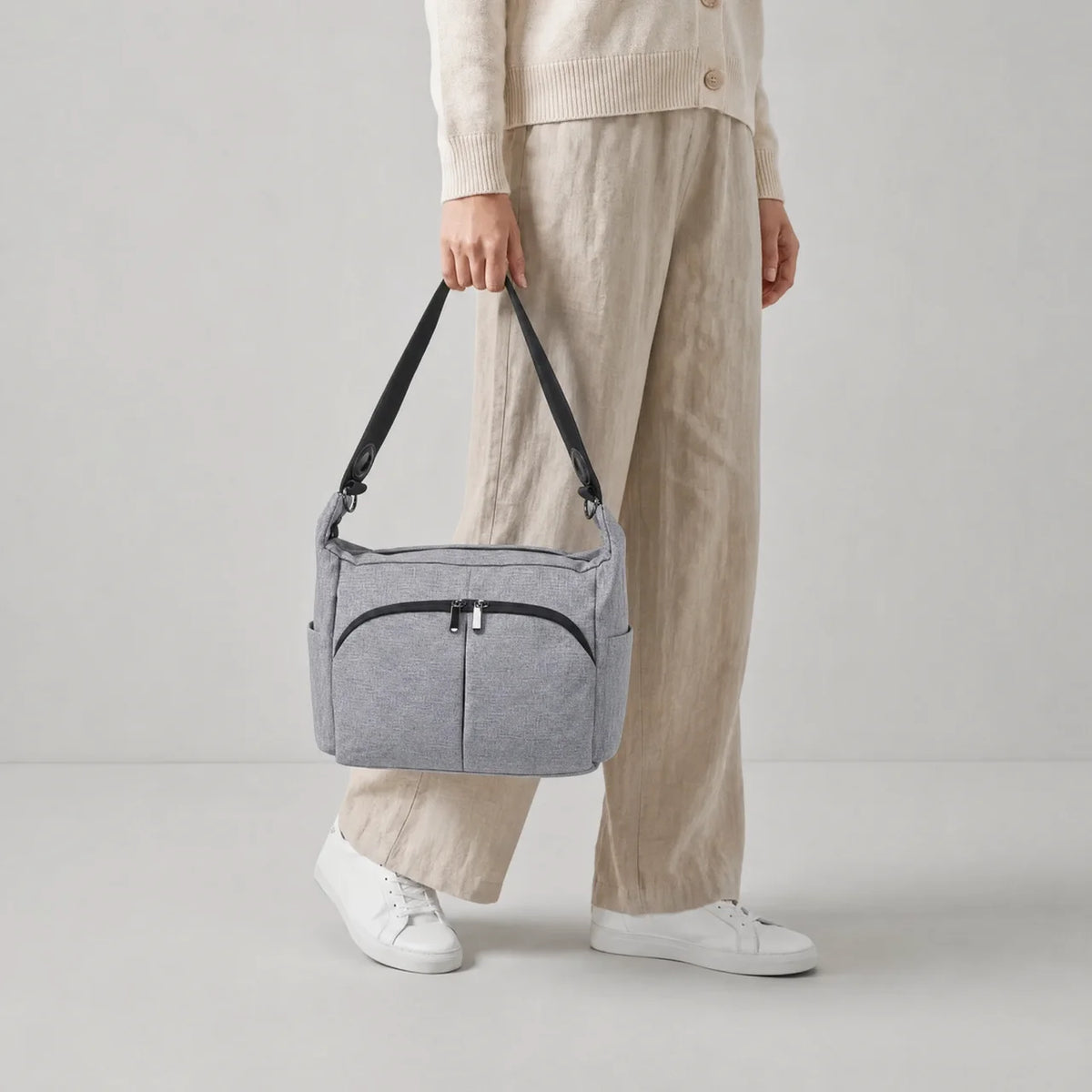 Sac à langer bandoulière polyester avec poches avant