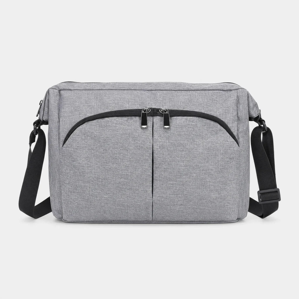 Sac à langer bandoulière polyester avec poches avant